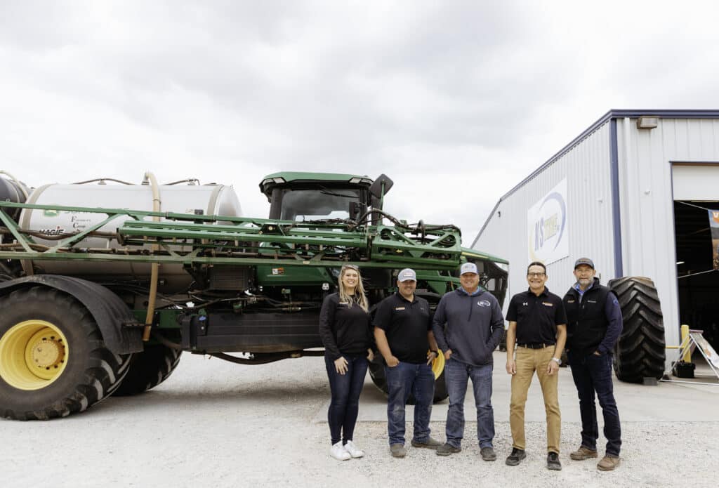 Ascenso team and a tractor at VF Tire field Day