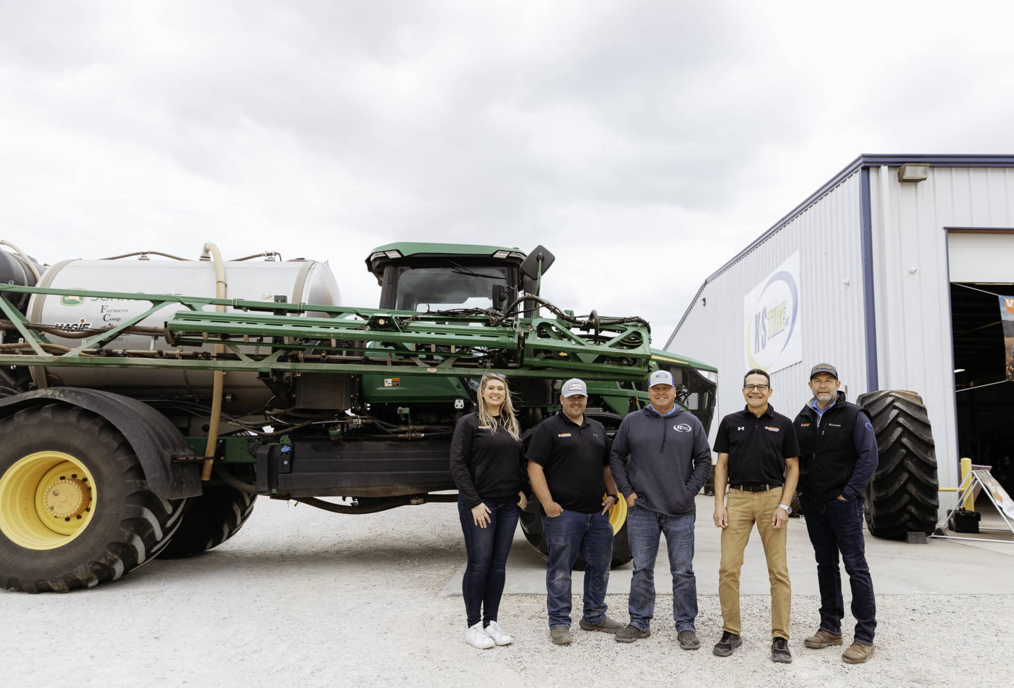 Ascenso team and a tractor at VF Tire field Day